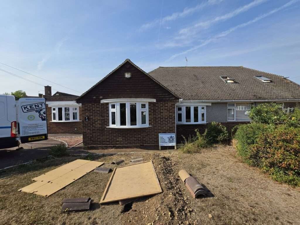 Bungalow with new white uPVC bay windows