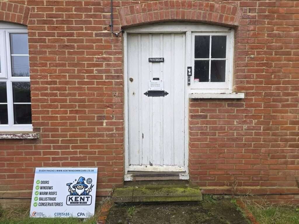 Old painted timber front door before replacement