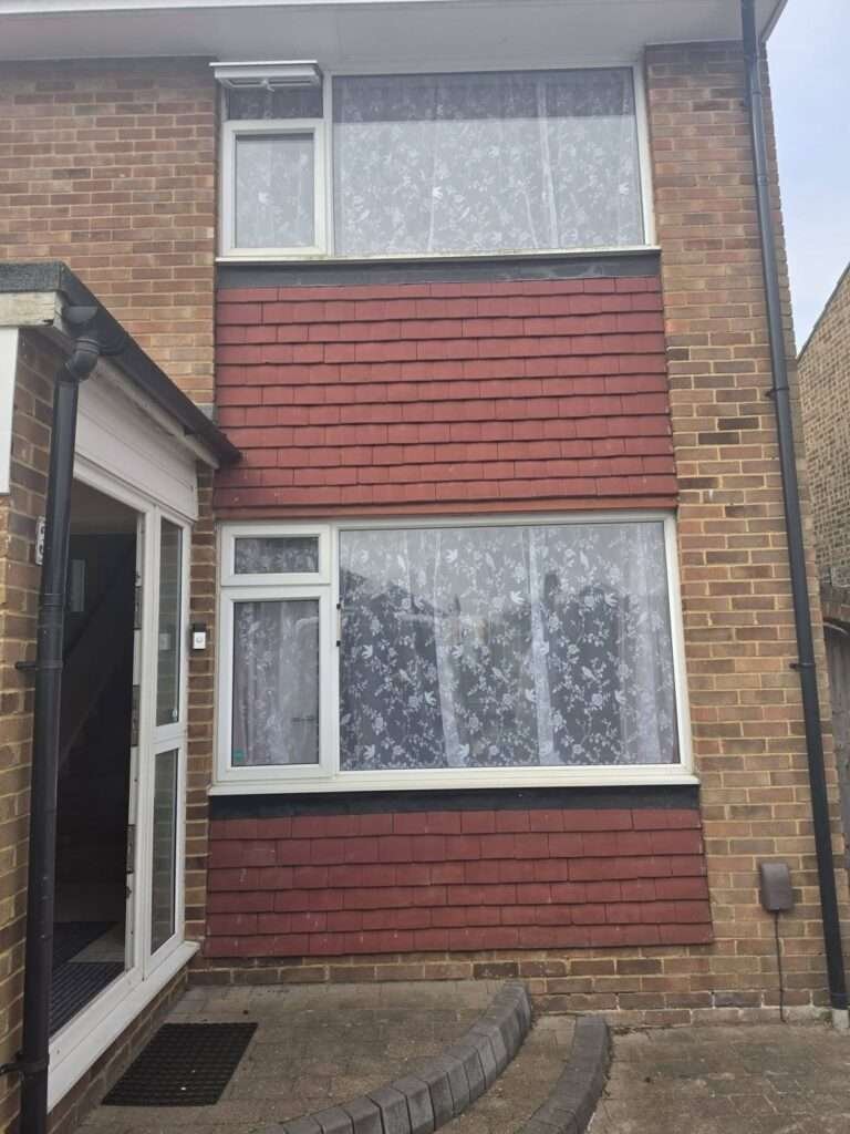 House with new white uPVC windows and a glazed side door